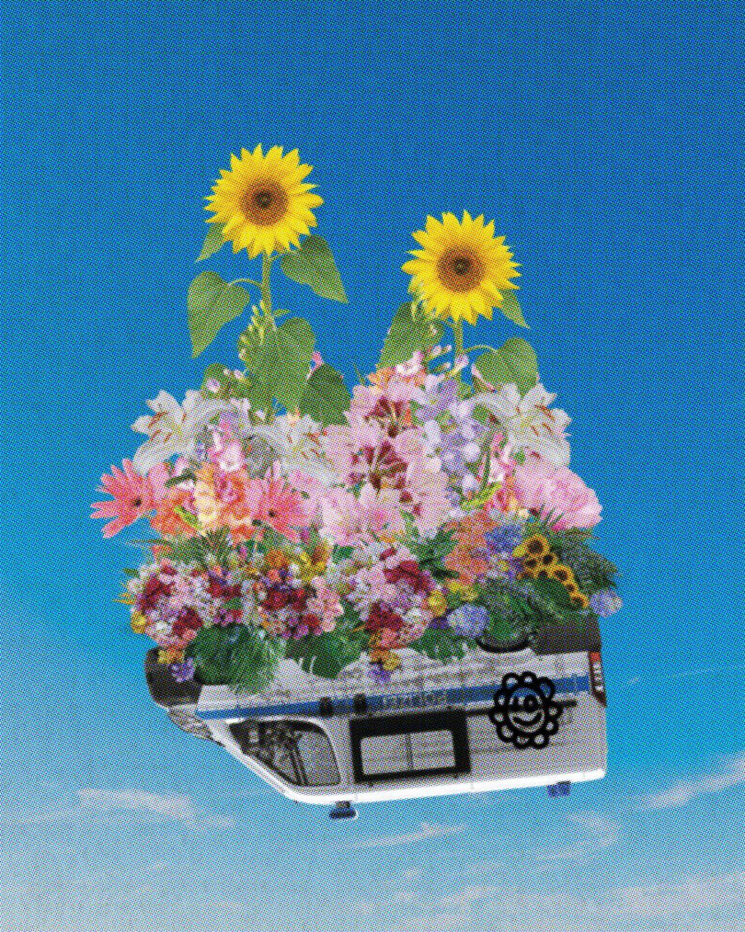 A collage of an upturned police van with a smiley flower spraypainted on the side. A large number of luscious flowers and greenery are growing out of the bottom of the vehicle, including two tall sunflowers. The background is a bright blue sky with a few wispy white clouds. 